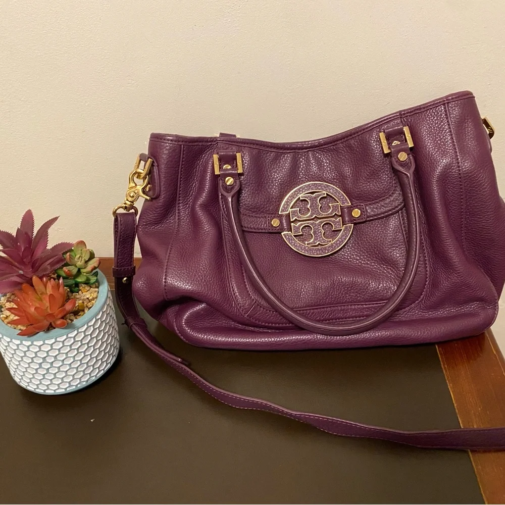 Tory Burch purple bag.